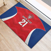 Red rugby doormat close-up with blue-white border, lion crest, YOUR TEXT 21