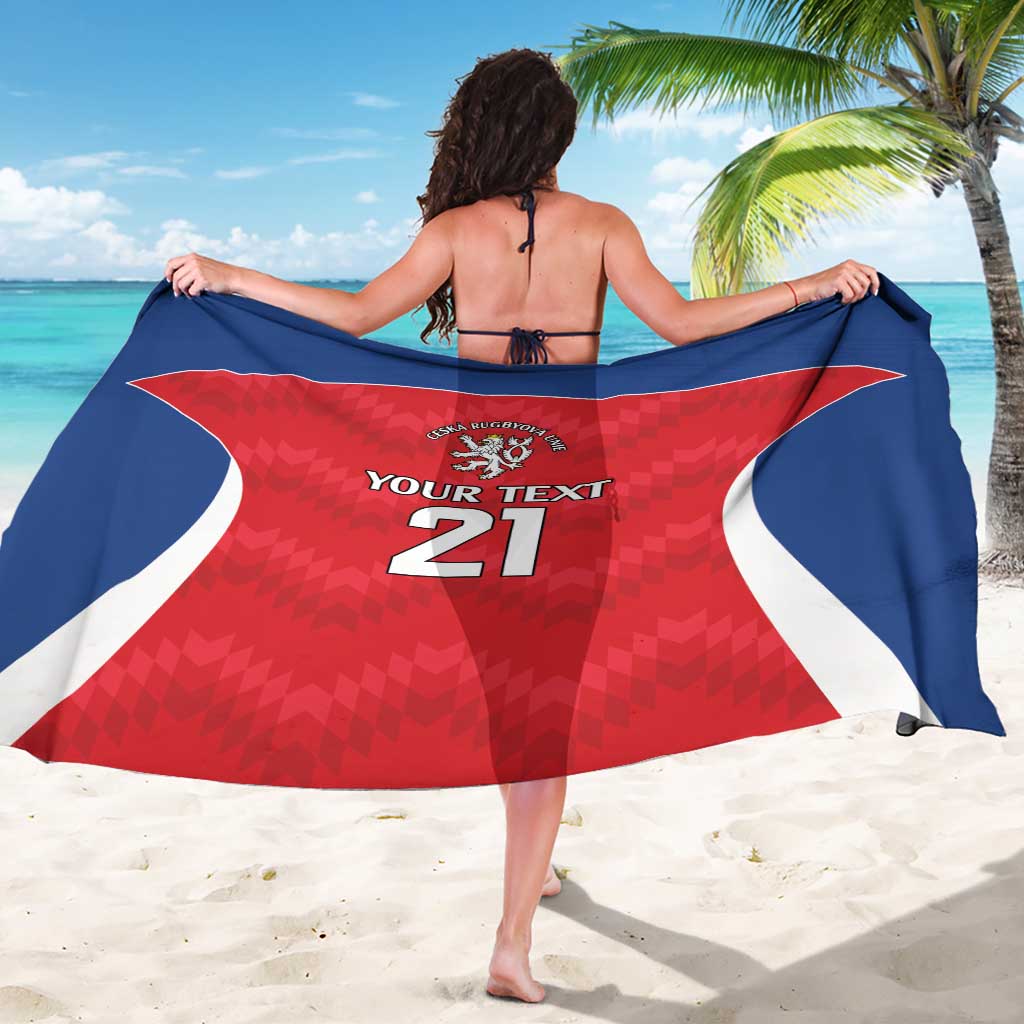 Navy-red lion sarong with white swoosh and 'YOUR TEXT 21' center print, draped back.