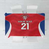 Red rugby-style custom tablecloth with lion crest and number 21, blue and white border
