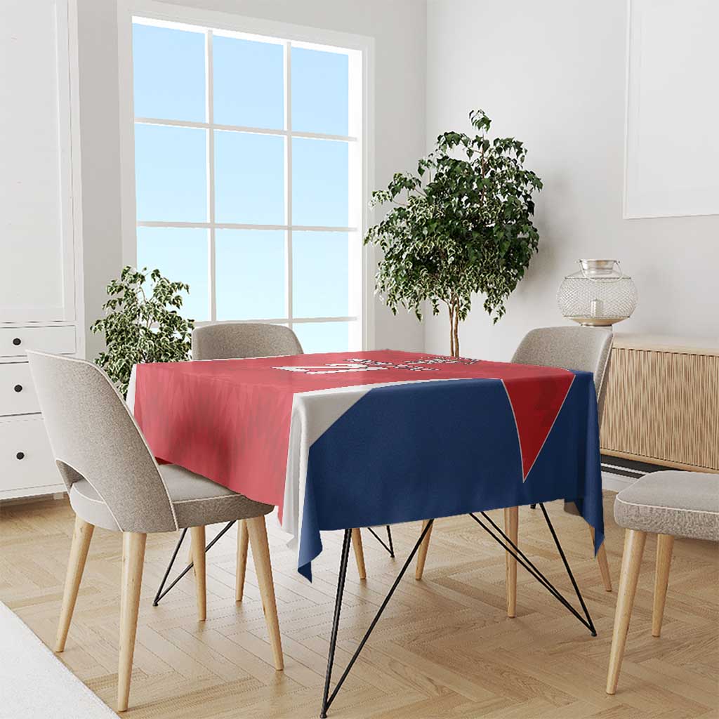 Red rugby tablecloth draped on dining table with blue-and-white jersey pattern