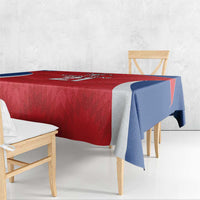 Red rugby tablecloth with blue-and-white stripe design and rounded edge drape