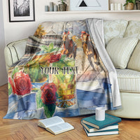 Personalized horse race blanket over armchair, featuring jockeys, roses, and 'YOUR TEXT'