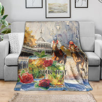 Personalized horse race blanket on sofa with jockeys, roses, and 'YOUR TEXT' text