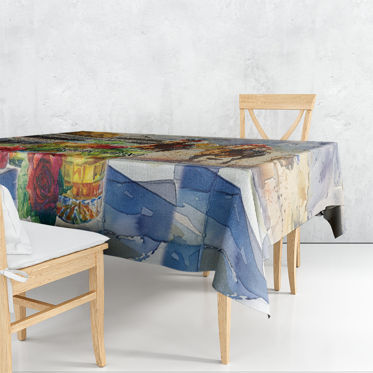 Horse race tablecloth draped on dining table with riders, horses, and roses print