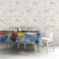 Horse race tablecloth on dining table showing roses and riders
