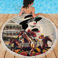 Round beige beach blanket featuring derby jockey and horses, white fringed border