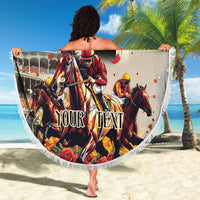 Round beige beach blanket with derby horses and jockey print, tassel-fringed edge