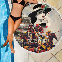 Round beige beach blanket with centered derby rider and horses print, white fringed edge