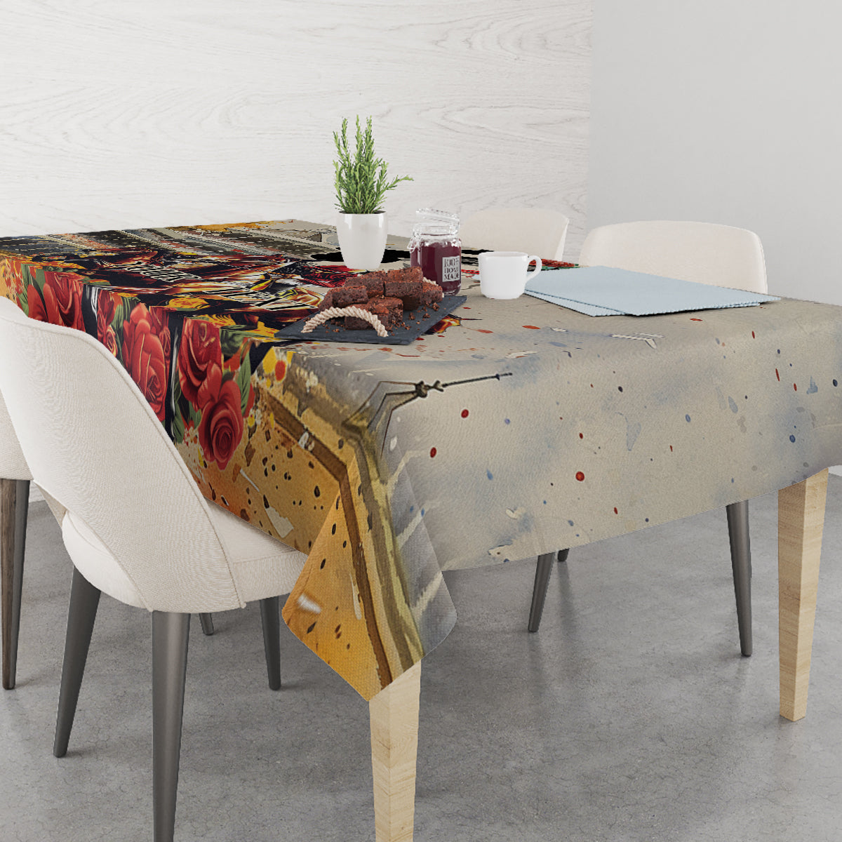Personalized tablecloth over dining table with roses and speckled racing artwork
