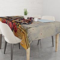 Personalized tablecloth over dining table with roses and speckled racing artwork