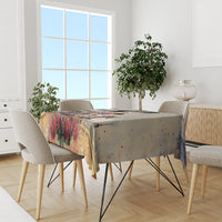 Personalized tablecloth on dining table with colorful horse-racing print