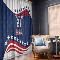 USA graphic window curtain with starry blue field and red-white stripes, hanging over window