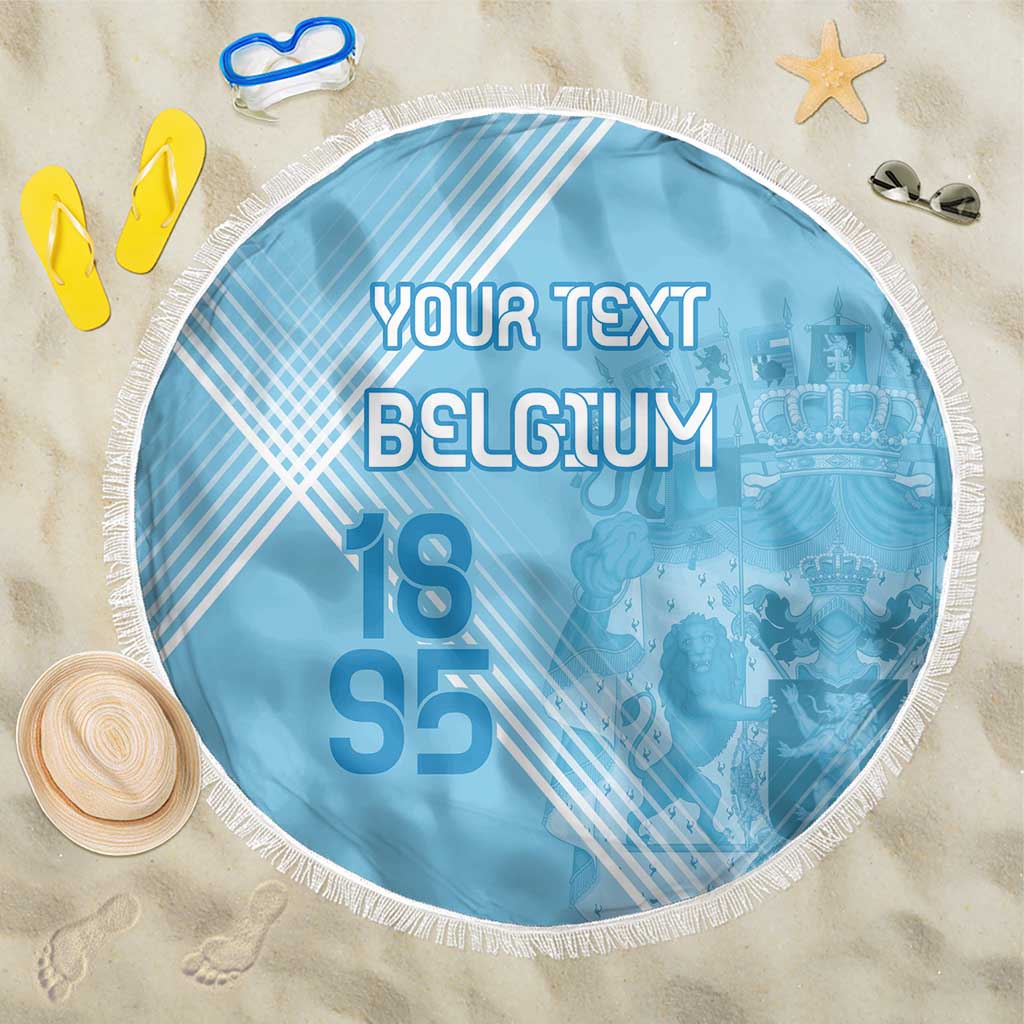 Round blue beach blanket with white fringe and printed text “YOUR TEXT BELGIUM 18 95”.