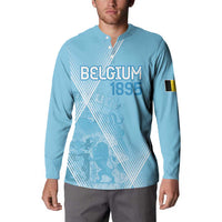 Light blue button-up sweatshirt with Belgium 1895 front graphic and flag sleeve patch