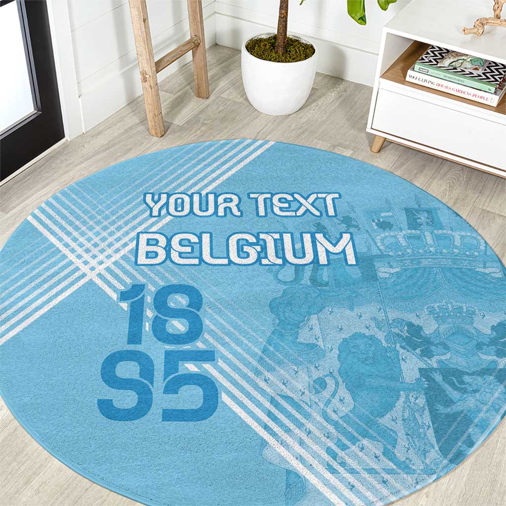 Blue round Belgium custom football rug on floor, showing “BELGIUM” and “18 55”