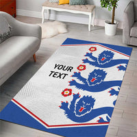 White area rug with blue lion faces, red border trim, and black 'YOUR TEXT' area