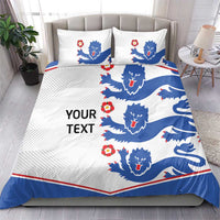 White bedding set with blue lion pattern, red details, and 'YOUR TEXT' on the duvet