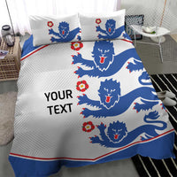 White duvet cover and pillow shams with blue lion faces and red flower accents