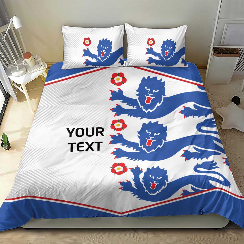 White bedding set with blue lion silhouettes, red accents, and a 'YOUR TEXT' design