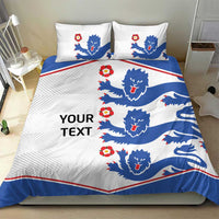 White bedding set with blue lion silhouettes, red accents, and a 'YOUR TEXT' design