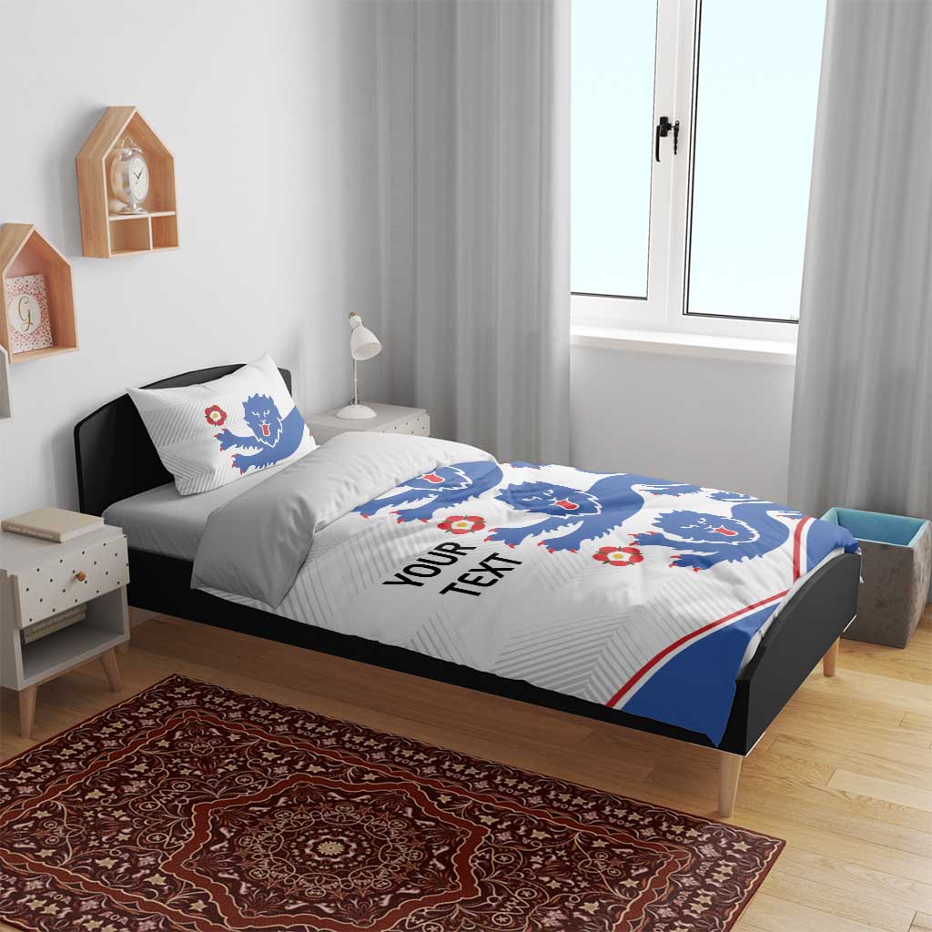 White duvet cover with blue lion graphics, red accents, and 'YOUR TEXT' text panel