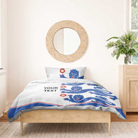 White bedding set with blue lion and red flower motif, 'YOUR TEXT' printed on duvet
