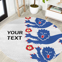 Round football rug with blue lion crests, red accents, and “YOUR TEXT” print