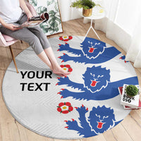 Round football rug with blue lion pattern, red accents, and “YOUR TEXT” area