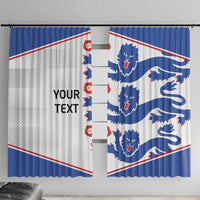 Front view of two blue and white window curtain panels with lion crest graphics