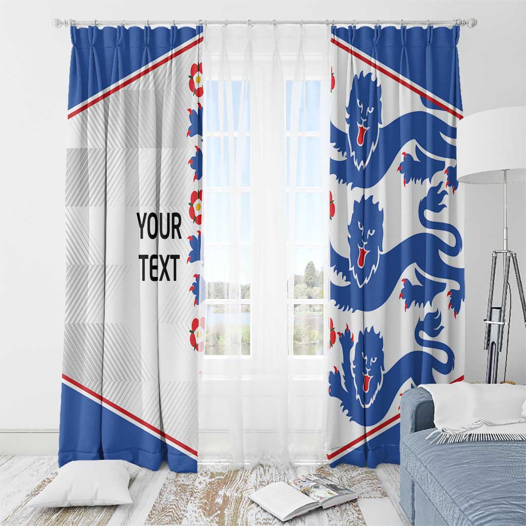 Hanging blue and white window curtain panels with lion crest designs and red trim border