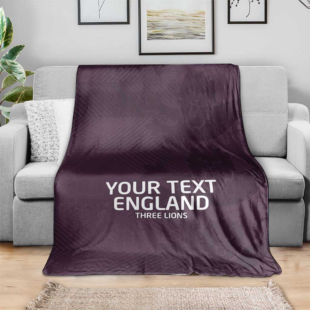 Purple football blanket with 'YOUR TEXT ENGLAND' and Three Lions text on sofa