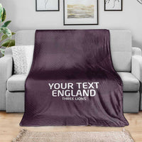 Purple football blanket with 'YOUR TEXT ENGLAND' and Three Lions text on sofa
