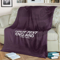 Purple football blanket with 'YOUR TEXT ENGLAND' and Three Lions text on couch