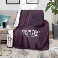 Purple football blanket with 'YOUR TEXT ENGLAND' and Three Lions text on carpet