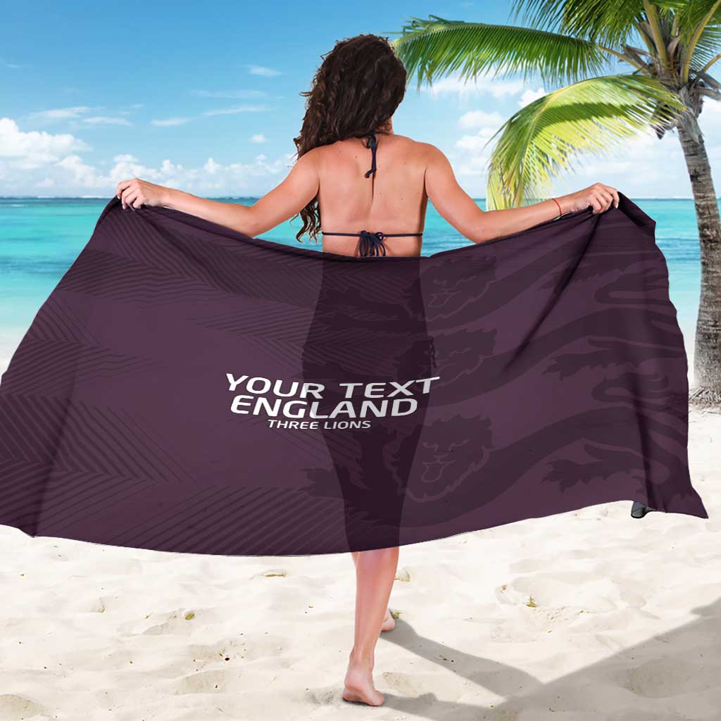 Purple printed sarong with center text, back view tied at the waist