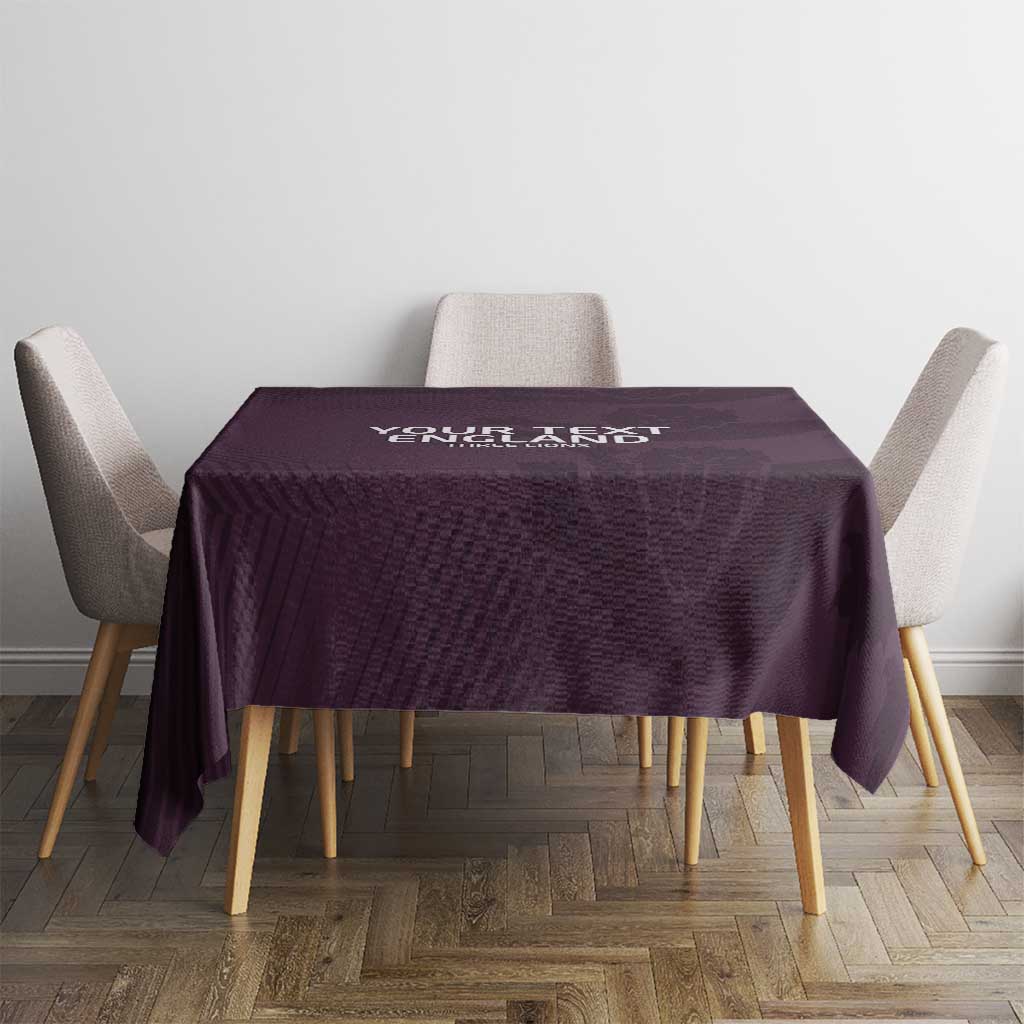 Purple football tablecloth covering a square dining table with four chairs