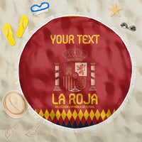 Red circular Spain beach blanket with white fringe, crest, and 'YOUR TEXT'.