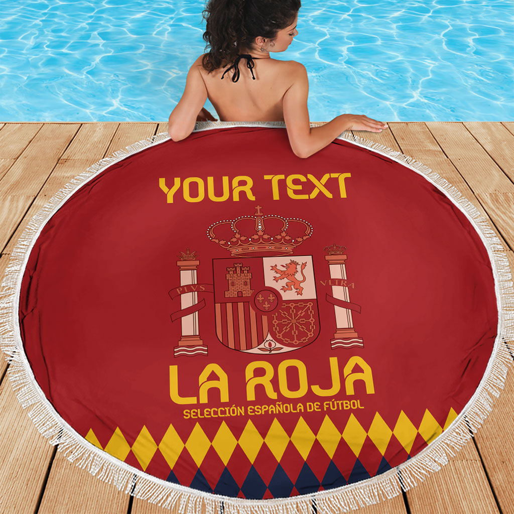 Red circular Spain football beach blanket with white fringe and centered 'YOUR TEXT'.