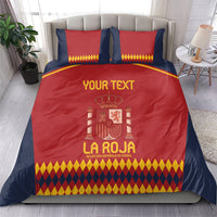 Red and navy bedding set with 'YOUR TEXT', crest graphic, and two matching pillowcases