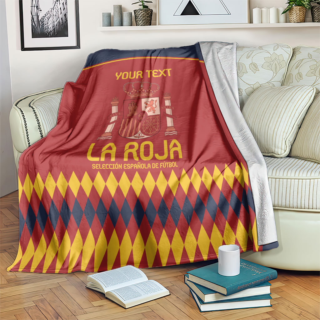 Spain football blanket, red and navy with crest graphic and diamond pattern hem