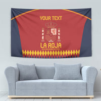 Red-and-navy Spain tapestry featuring crest, yellow lettering, and diamond-pattern bottom trim