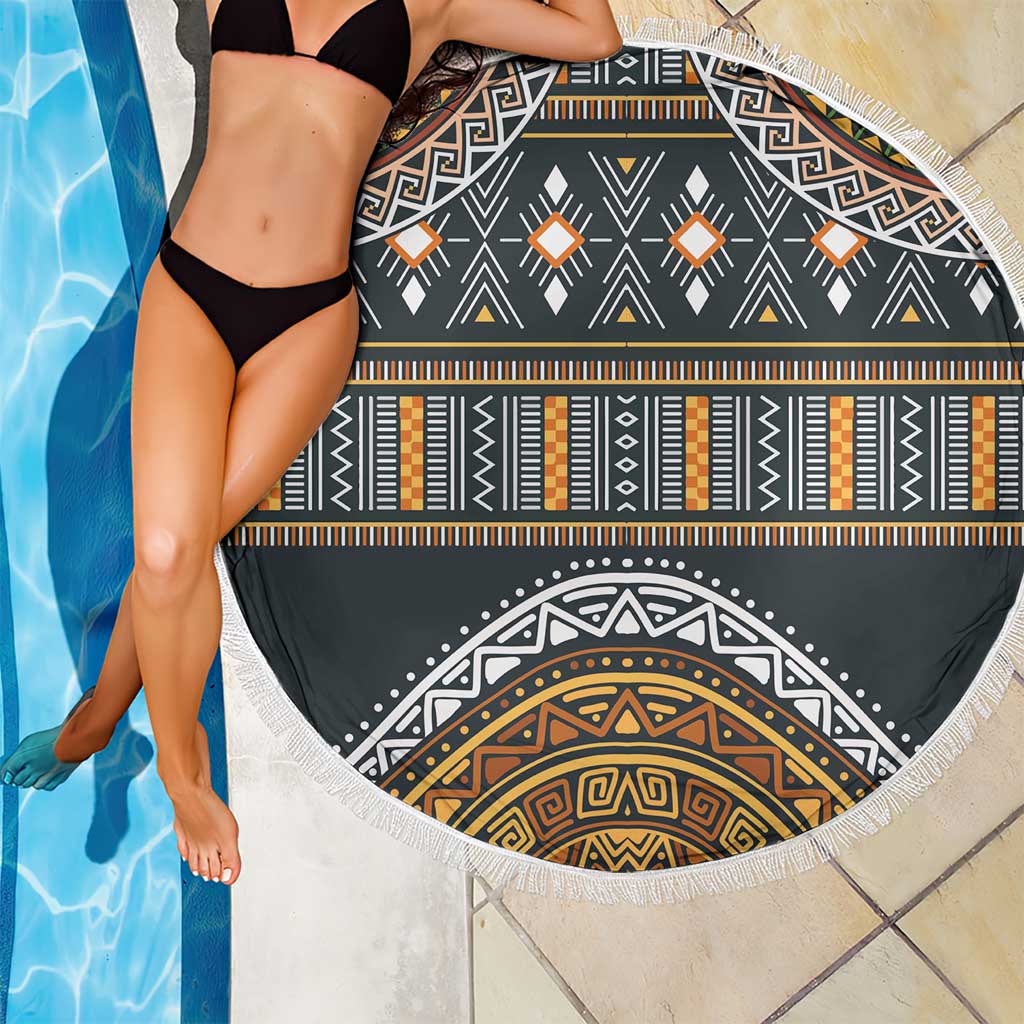 Round beach blanket with tribal geometric print, black, white, gold accents, white fringe