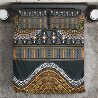 Charcoal bedding set with gold, orange, green geometric tribal pattern; duvet and pillows.