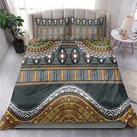 Charcoal duvet cover and two pillowcases with gold, green, orange geometric band pattern.