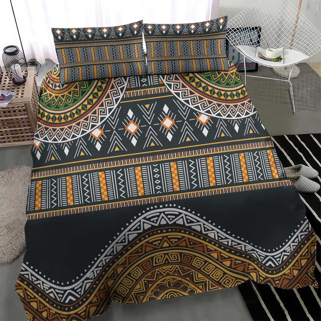 Charcoal duvet cover set with bold geometric bands and arched tribal motif; matching pillowcases.