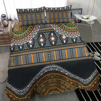 Charcoal duvet cover set with bold geometric bands and arched tribal motif; matching pillowcases.