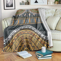 Ethnic patterned blanket with geometric motifs in dark gray, gold, orange, white