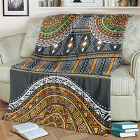 Tribal geometric pattern blanket in dark gray with gold, orange, green, and white details