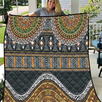 Ethnic quilt close-up, black with gold, green and orange semicircle tribal motifs