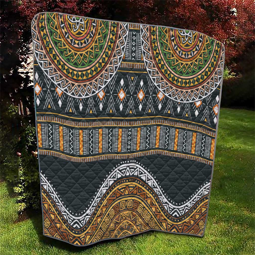 Ethnic quilt folded view, black with gold, green, orange and white tribal motifs
